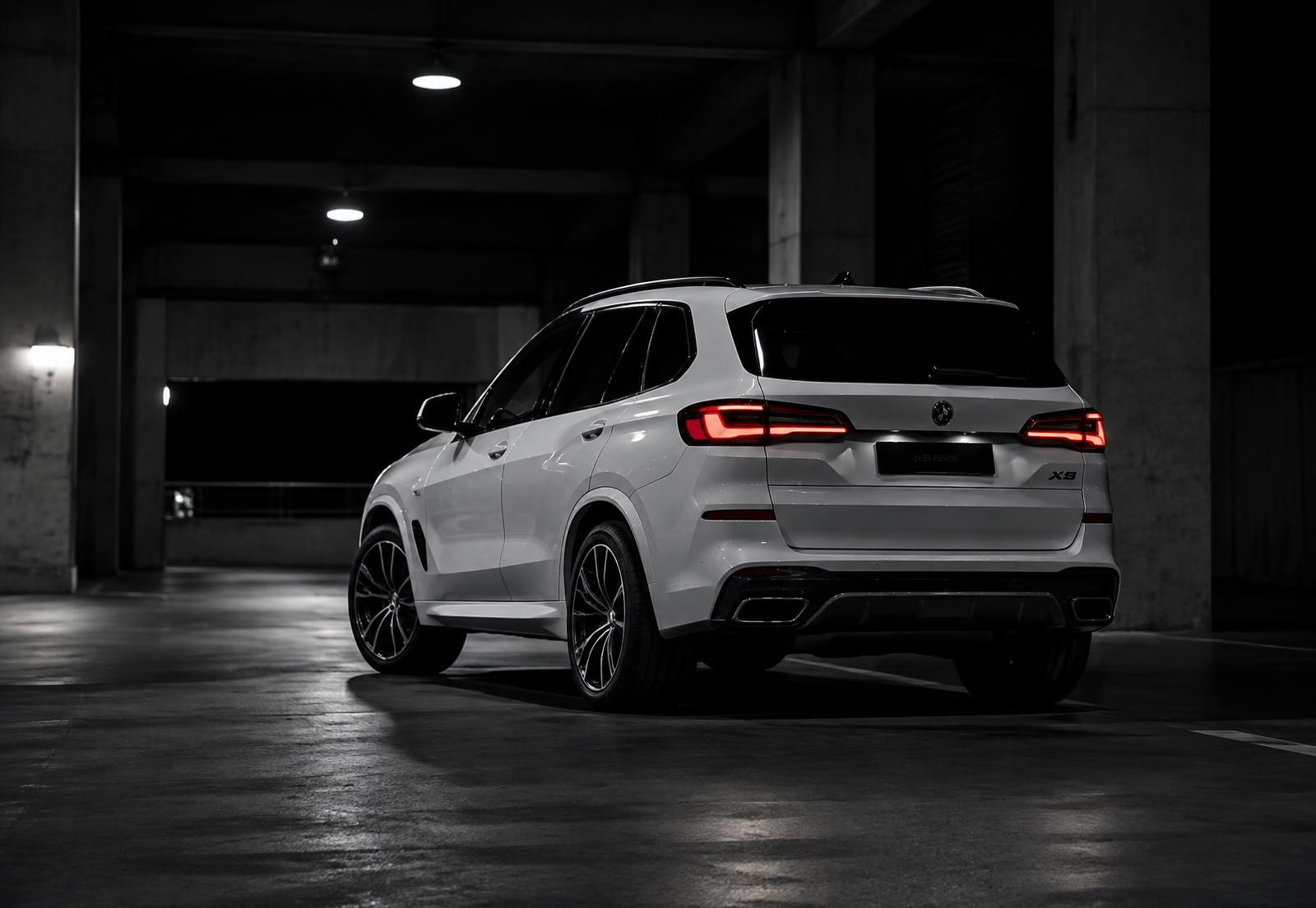 2025 BMW X3 in white, rear three-quarter view
